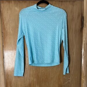 Nike Woman’s Light Blue Fitted Long Sleeve Tee